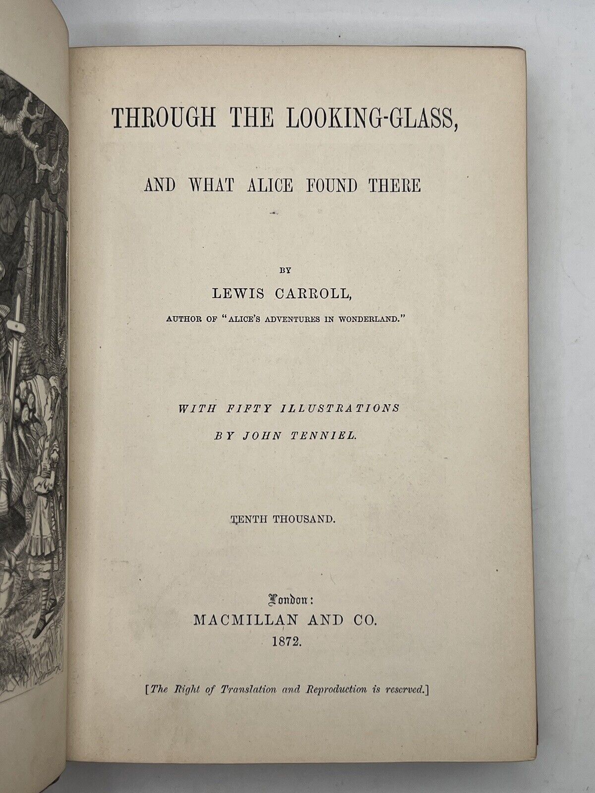 Alice in Wonderland & Through the Looking Glass by Lewis Carroll First Editions